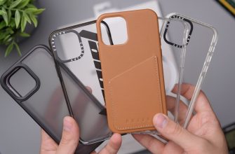 person holding orange leather smartphone case